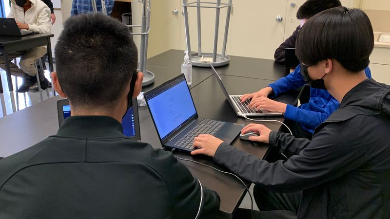 Students coding at a CS Club meeting